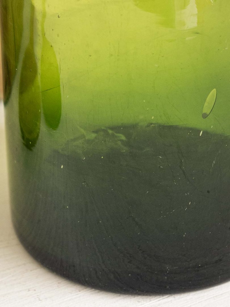 grand bocal en verre vert avec son bouchon en liège