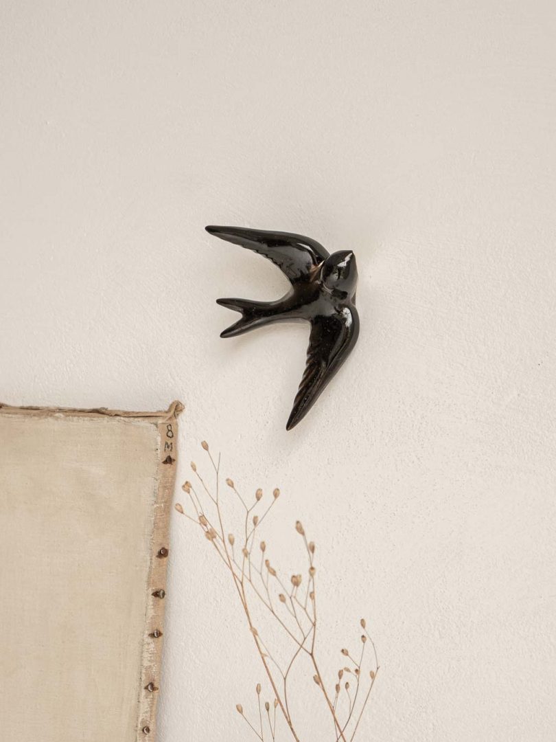 hirondelle en céramique noire pour décoration murale
