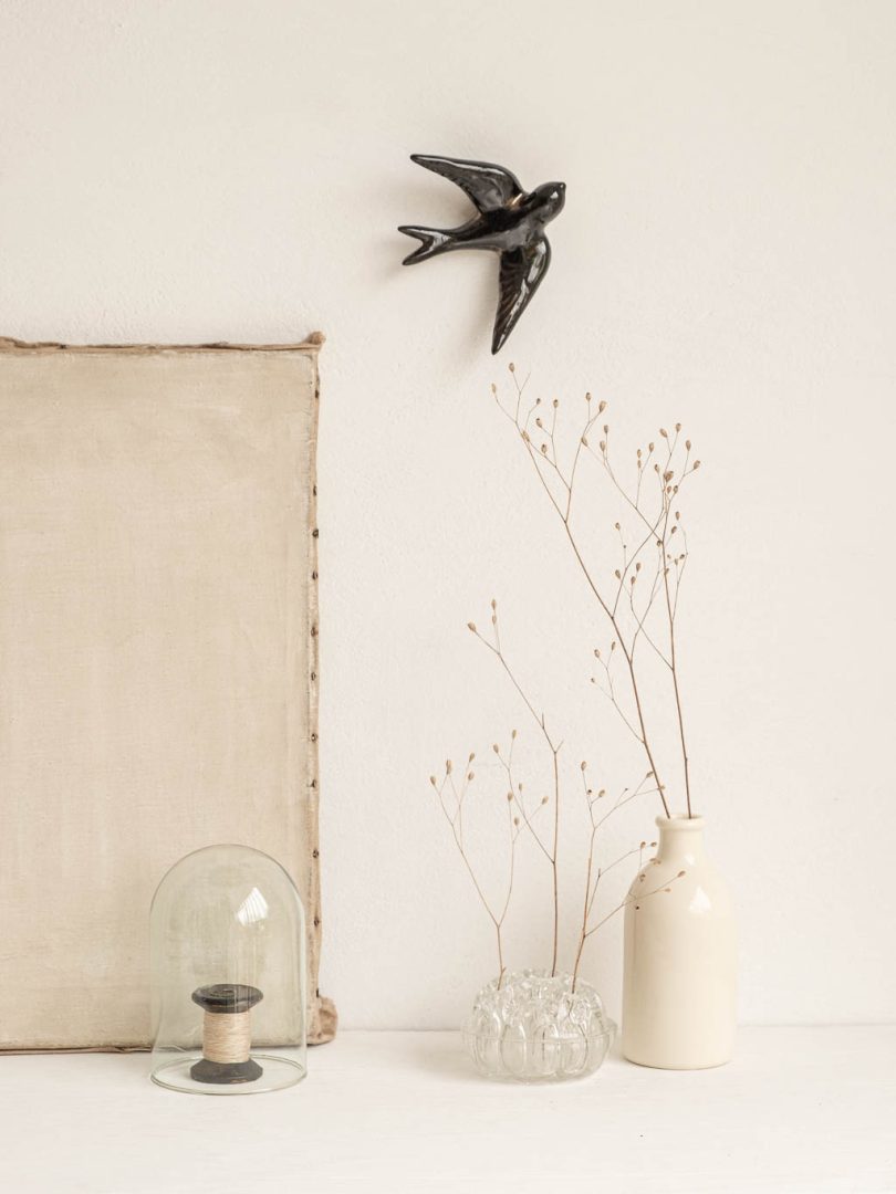 hirondelle en céramique noire pour décoration murale
