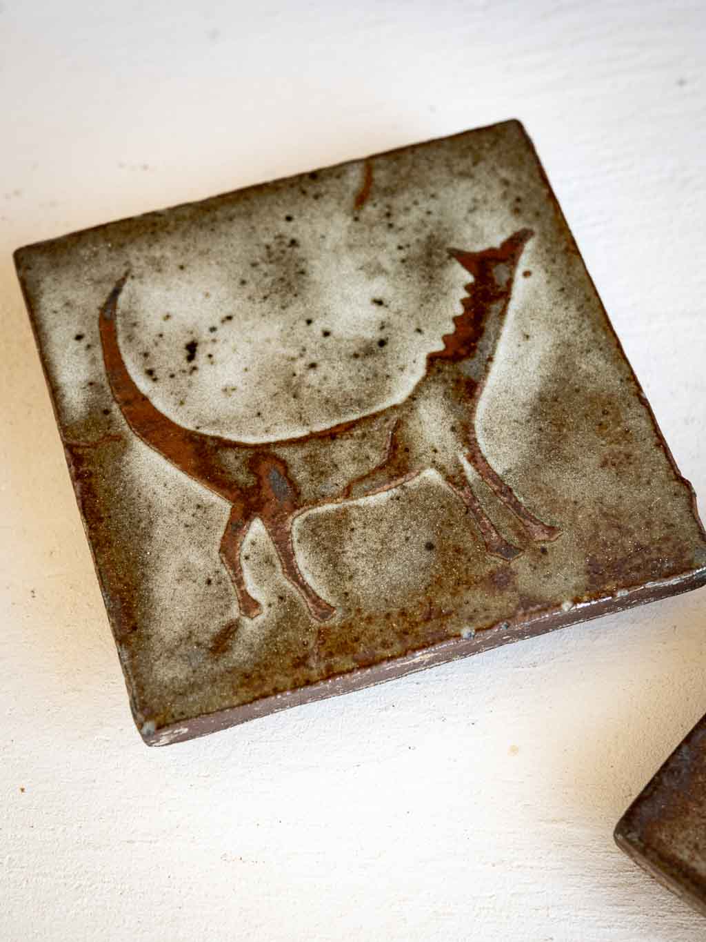 lot 2 dessous de bouteille, carreaux en grès