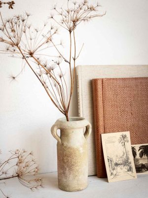 Vase jarre en céramique blanche patinée