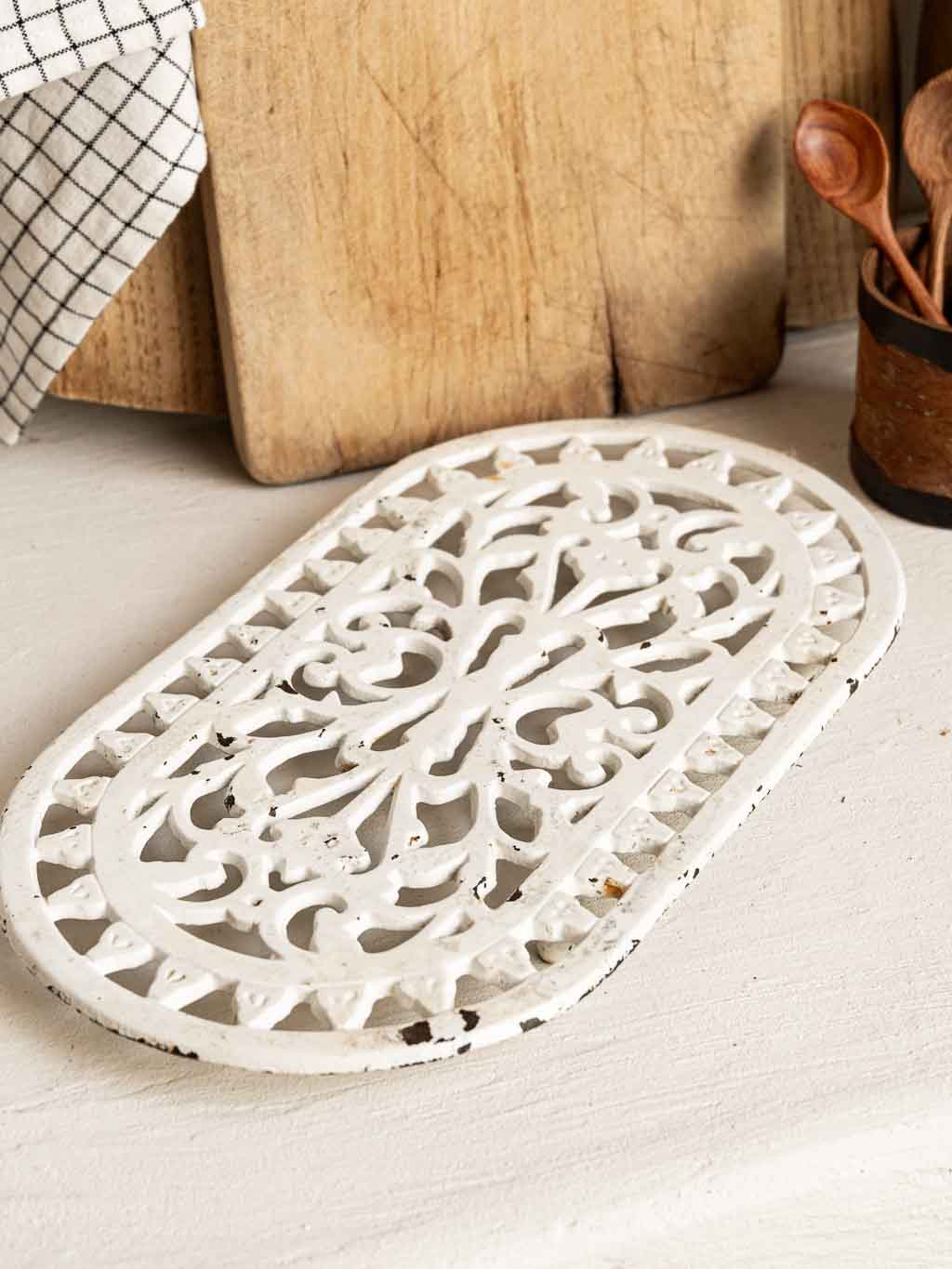 dessous de plat en fonte émaillée blanche